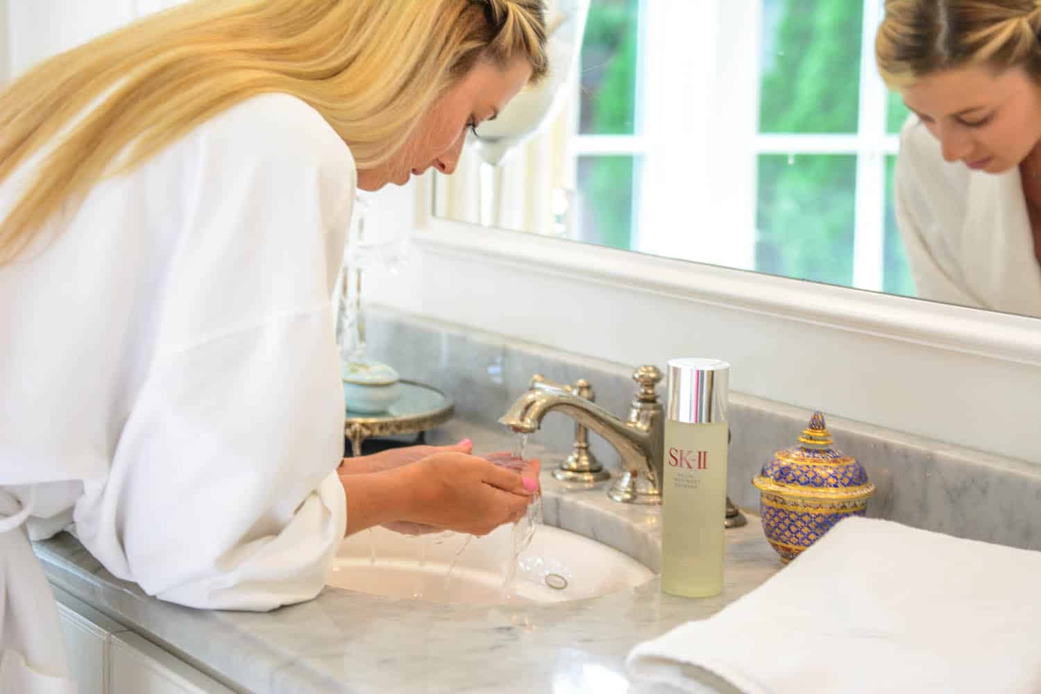 my summer skincare routine using SK-II facial treatment essence in the morning