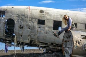 Lesley Murphy on a plane crash wreckage in Iceland