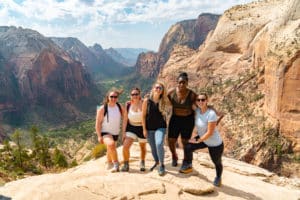 group of women hiking up angle's landing at zion national park