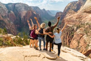 group of women hiking up angle's landing at zion national park