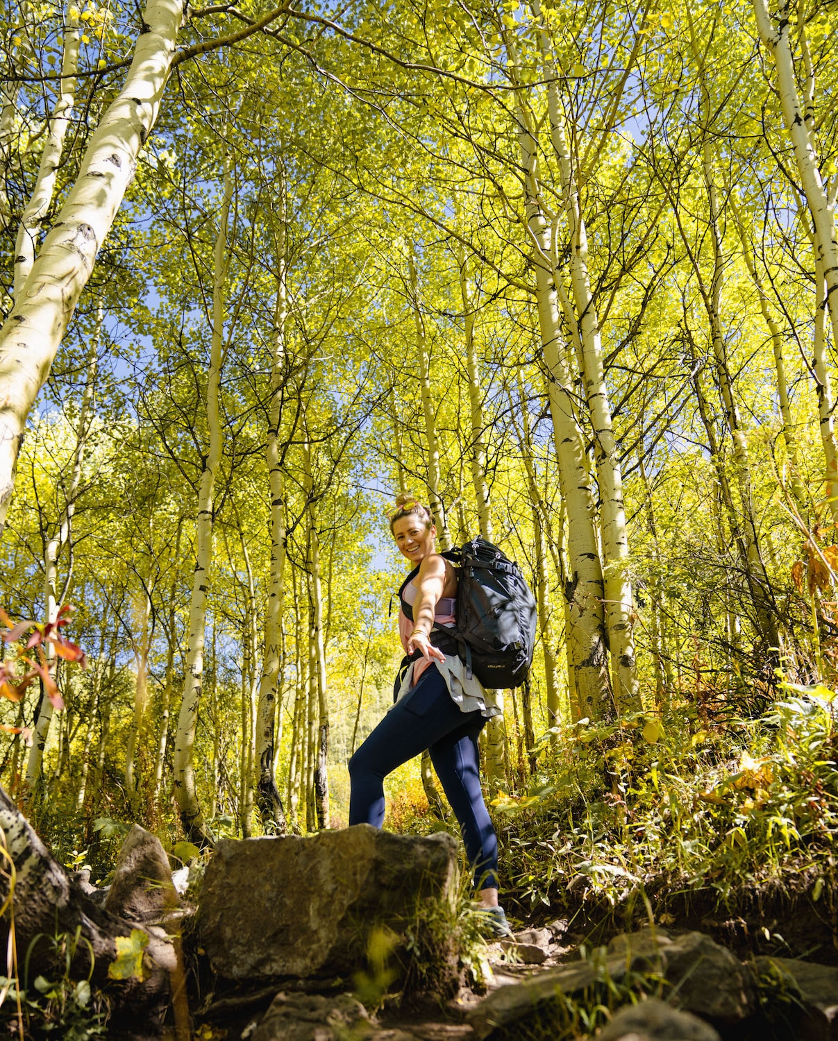 woman hikes in vail colorado