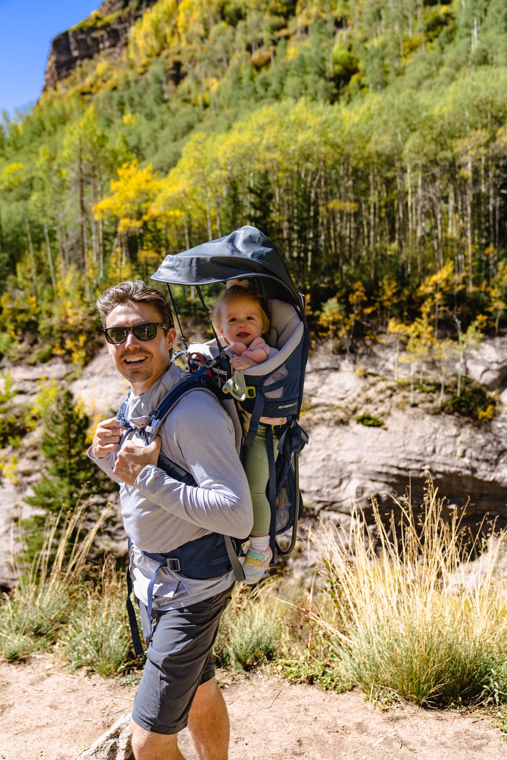 man and child hike in vail colorado